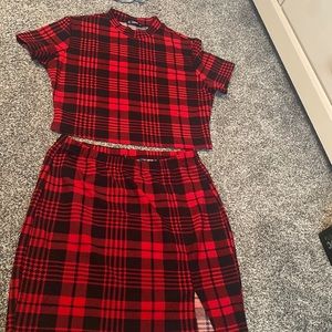 Size 1xl two piece short sleeve shirt with skirt from shein. Black and red